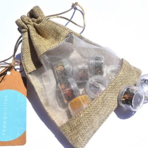 A bag of different kinds of oils and a tag