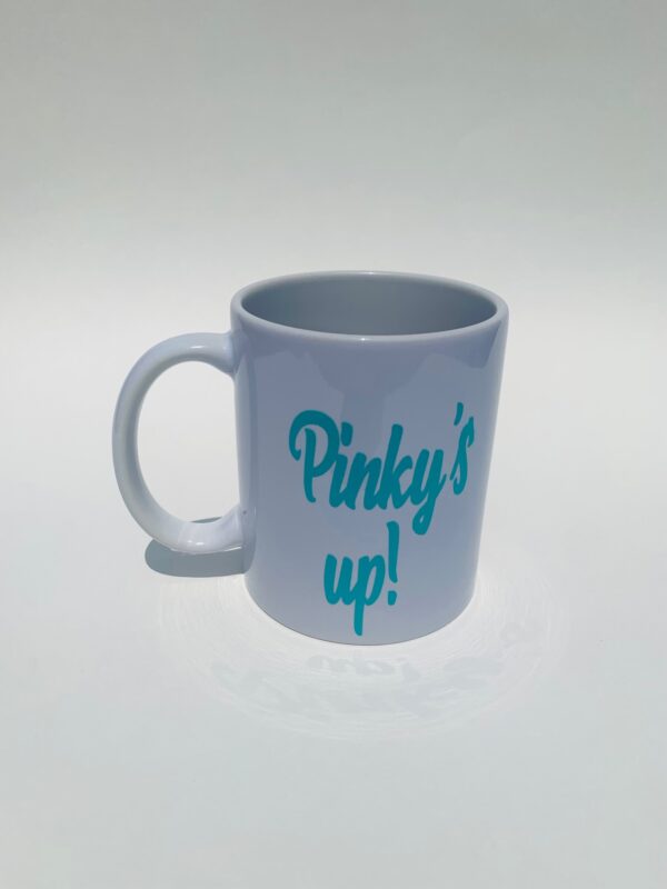 A white coffee mug with the words pinky 's up on it.
