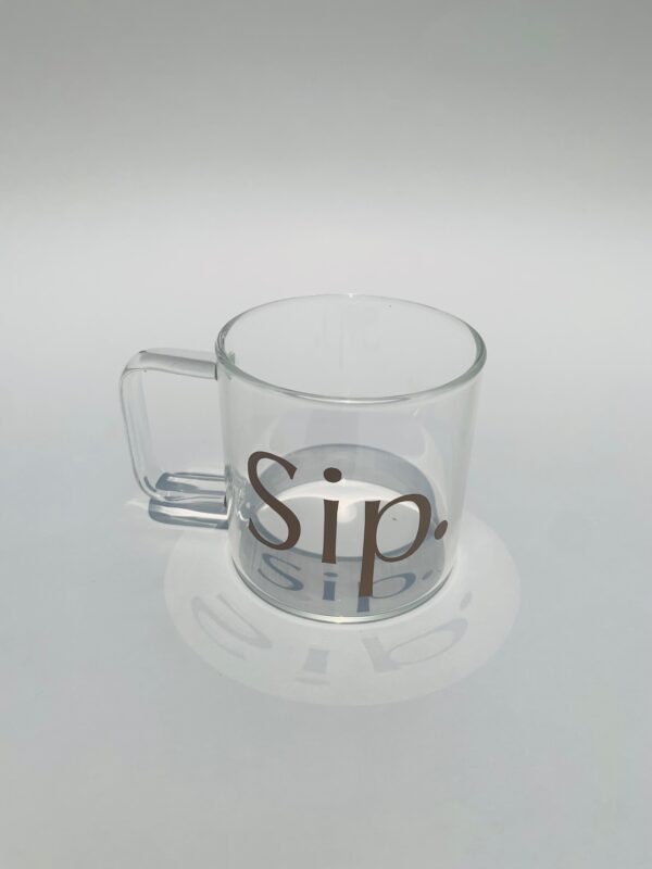 A clear cup with the word sip written on it.